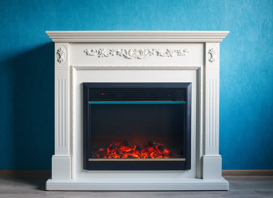 Eckkamine flexibel aufstellbar Eckkamin vor einer blauen Wand