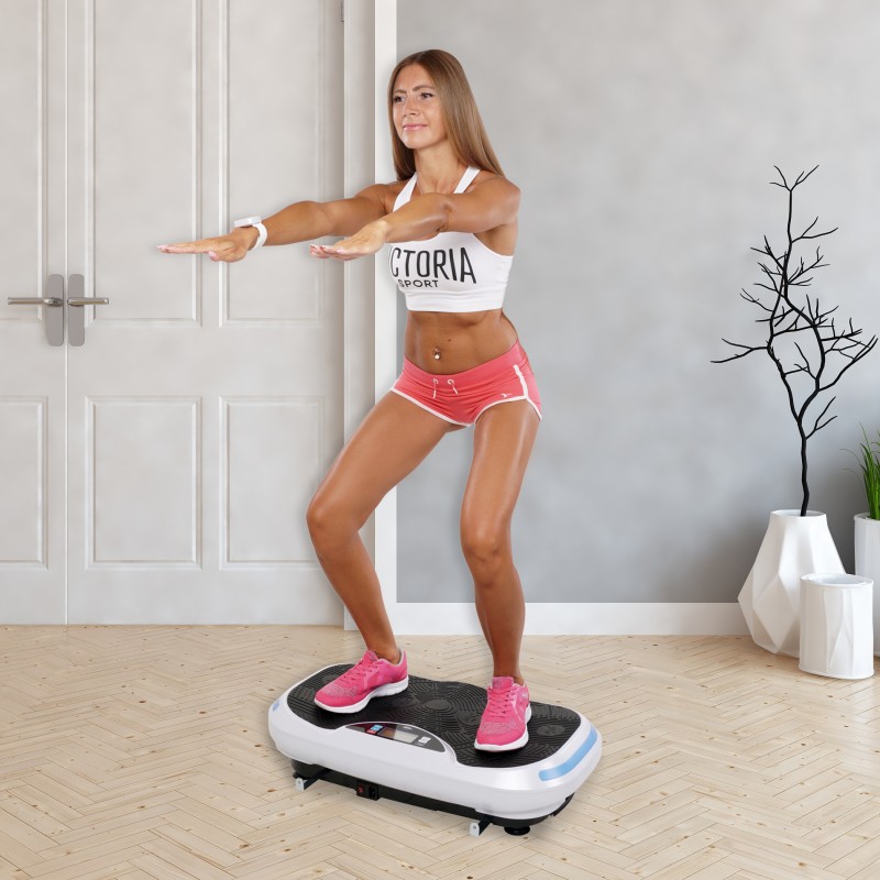 Ganzkörpertraining auf der Vibrationsplatte Zuhause mit Kniebeugen auf der Vibrationsplatte fit halten