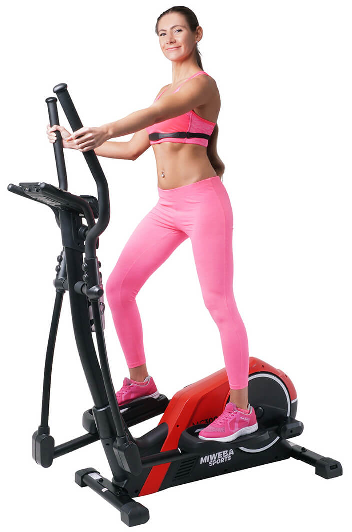 Informationen zu Crosstrainer und Ellipsentrainer Sportliche Frau auf einem roten Crosstrainer